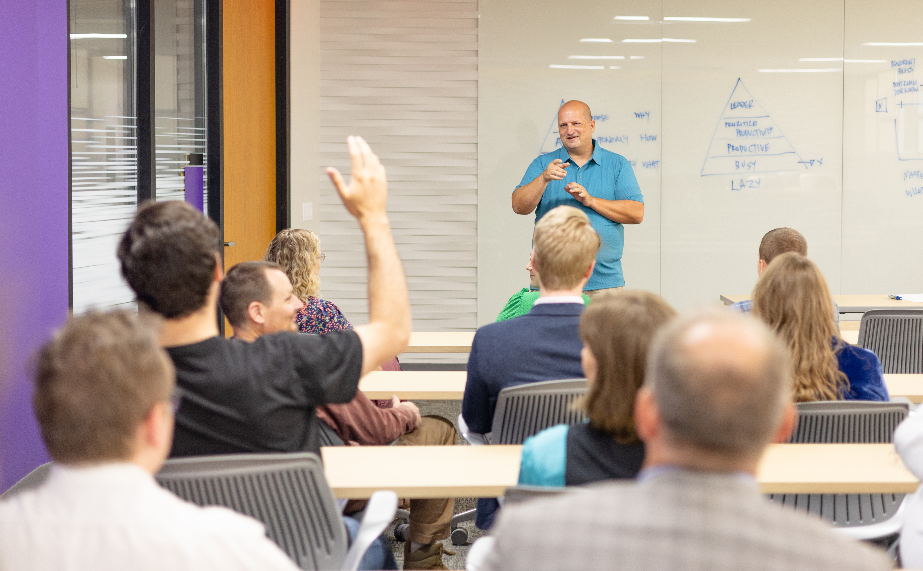 Speaker presenting to an audience